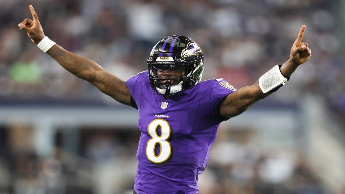Baltimore Ravens quarterback Lamar Jackson celebrates